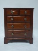 A Victorian mahogany apprentice piece, miniature chest of drawers, H.38 W.32 D.20cm