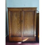 An early 20th century oak side cabinet, H.99 W.77 D.50cm