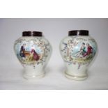 A pair of hand painted baluster form temple jars. H.26cm