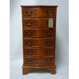 A serpentine fronted yew wood pedestal chest of six drawers, raised on bracket feet, H.98 W.50 D.