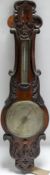 A late 19th century oak barometer