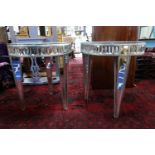 A pair of contemporary mirrored side tables, with glass tops, raised on tapered legs, H.71 W.63cm