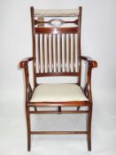 An Art Nouveau mahogany folding steamer/campaign chair
