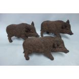 Three resin wild boars, H.30 L.50cm (3)