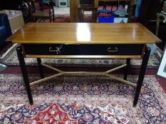 A mid 20th century G-plan teak top desk by E.Gomme, with two drawers raised on tapered legs, H.74