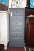 A grey painted pedestal chest of six drawers, on plinth base, H.110 W.45 D.44cm