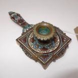 A French enamel chamberstick, polychrome decorated with scrolling foliage, on shaped square base and