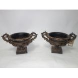 A pair of 18th century style urns, H.30 W.46 D.32cm