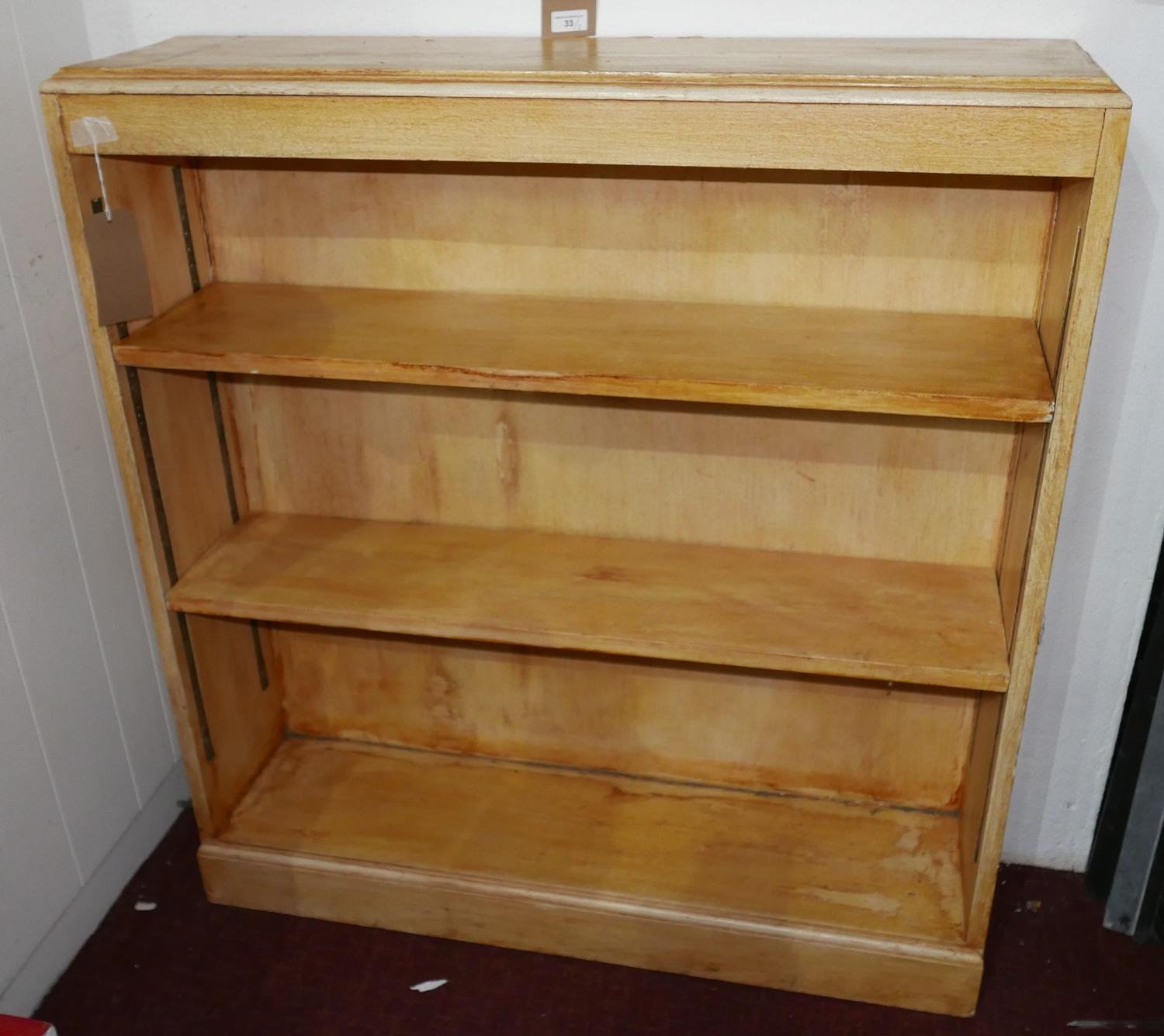 A 20th century bookcase with crackle finish, H.110 W.100 D.26cm