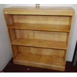 A 20th century bookcase with crackle finish, H.110 W.100 D.26cm