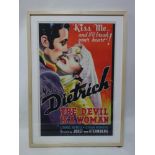 A reproduction movie poster for The Devil is a Woman starring Marlene Dietrich, bearing King & McGaw