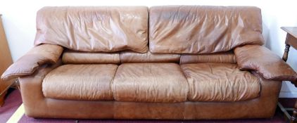 A 1970's Roche Bobois brown leather three seat sofa