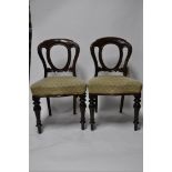 A pair of Victorian mahogany dining chairs