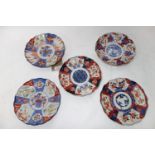A pair of 19th century Imari plates (D.22cm) and 3 others similar.