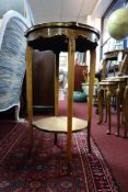 An early 20th century French walnut lamp table, with floral parquetry inlay and gilt metal mounts,