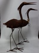 A pair of sheet metal herons, H.112cm (2)