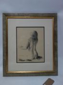 A framed and glazed charcoal drawing of a nude signed K Maunder. H.35 W.29cm
