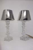 A pair of Baccarat crystal table candle holders in the form of lamps, by Phillipe Starck, H.33cm, in