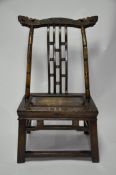 An early 20th century Chinese hardwood and part lacquered chair with carved back rest, H.86 W.47 D.