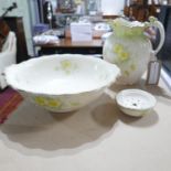 A 19th century Carlton Ware ivory porcelain jug and wash bowl with floral decoration