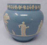 A late 19th / early 20th century Dudson jasperware vase, continuously decorated with Classical