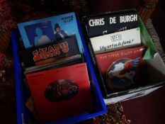 A collection of vintage vinyl records in three boxes
