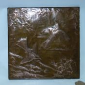 John Holton, an embossed copper plaque decorated with birds and flowers, signed, 46 x 46cm