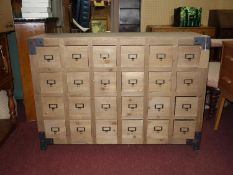 A contemporary Industrial style chest of 25 drawers, H.82 W.115 D.40cm