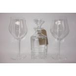 A St Louis crystal decanter, H.22cm, together with a pair of St Louis crystal wine glasses with