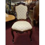 A 19th century French mahogany side chair and a beech ladder back armchair.