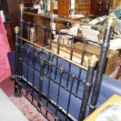 A Victorian brass and iron bed frame