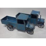 Two tin plate toy trucks, H.33 W.66 D.24cm (2)