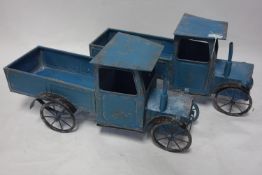 Two tin plate toy trucks, H.33 W.66 D.24cm (2)