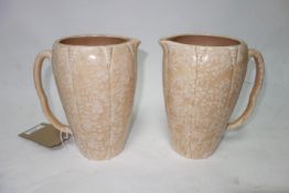 A pair of Arthur Wood Art pottery jugs. H.20cm.