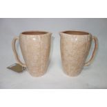 A pair of Arthur Wood Art pottery jugs. H.20cm.