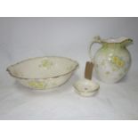 A Victorian jug and bowl set with allover floral decoration. (Bowl D.43cm)