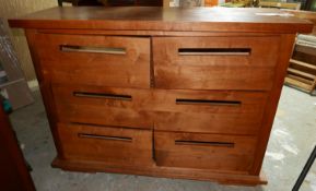 A 20th century teak chest of drawers, 100 x 148 x 50cm