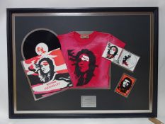 A framed Madonna record, cd and t-shirt by Warner Bros to regonise the collective sales, 76 x 110cm