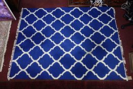 An Indian agra carpet with blue & white design, 224 x 167cm