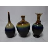 Three Persian drip glazed vases of varying form, H.36cm (tallest)