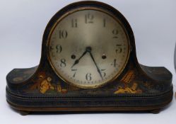 A Chinoserie lacquered mantel clock, the silvered dial with Arabic numerals, lacquer case