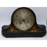 A Chinoserie lacquered mantel clock, the silvered dial with Arabic numerals, lacquer case