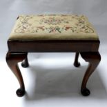 A Georgian style mahogany foot stool with tapestry upholstery, H.51 W.58 D.40cm