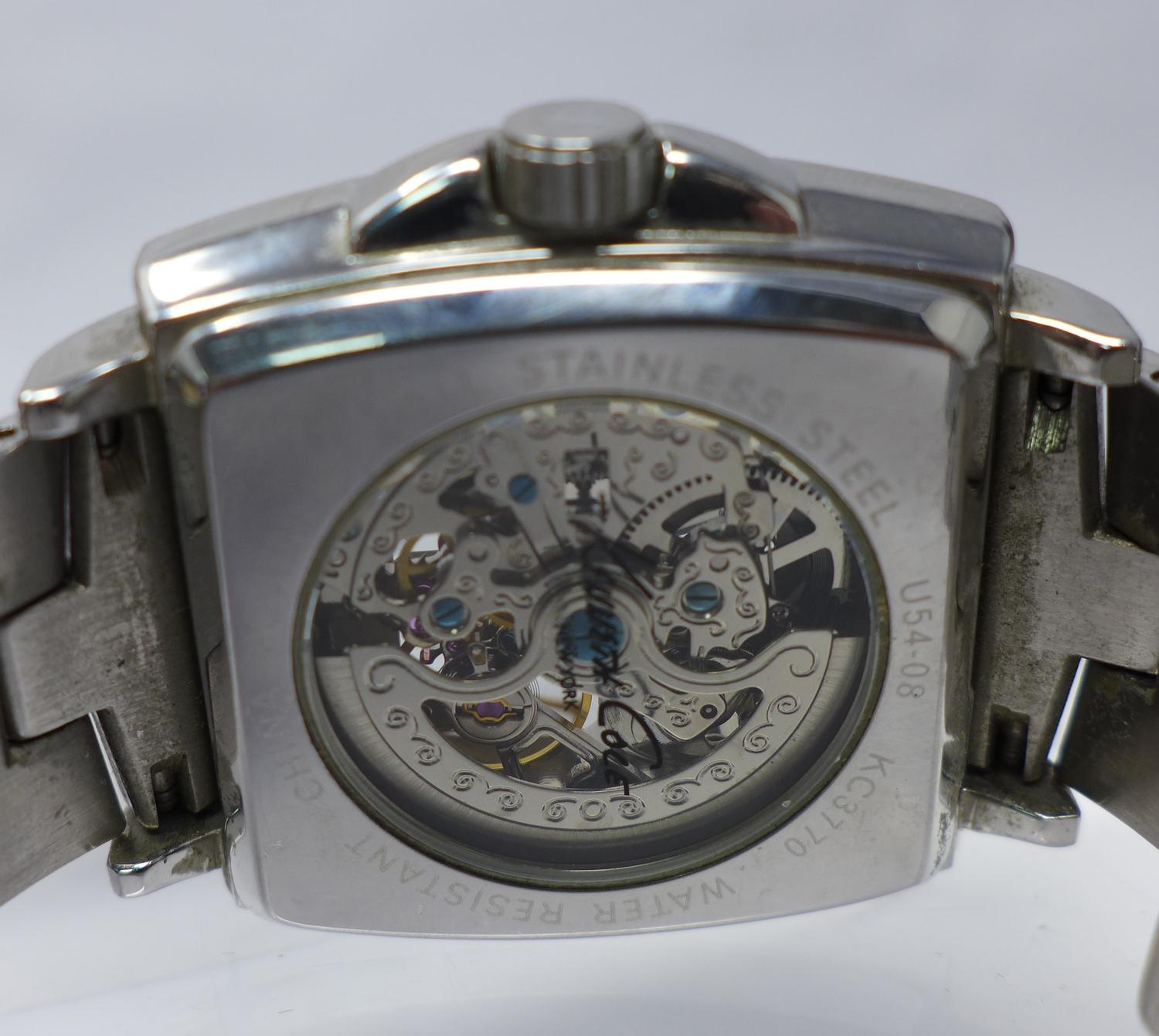 A Kenneth Cole gentleman's stainless steel wristwatch, skeleton dial with baton markers and Arabic - Image 2 of 3