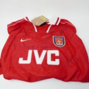 A 1990's signed Arsenal football shirt