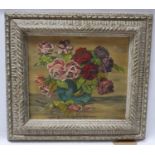 A still life study of roses in a vase, signed V Semal and dated 1936, oil on board, in distressed