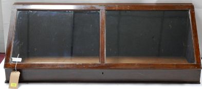 A mahogany table top bidjouterie cabinet with glazed hinged lid, H.44 W.130 D.43cm