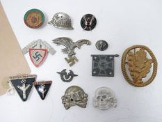 A collection of Third Reich pin badges and buttons, to include two NS Frauenschaft (Women's