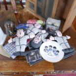 A collection of Beatles memorabilia to include a babushka doll, 4 soft dolls, 2 VHS videos, an alarm