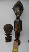 An African carved tribal reliquary figure, H.27cm, together with an ebonised tribal figure, H.